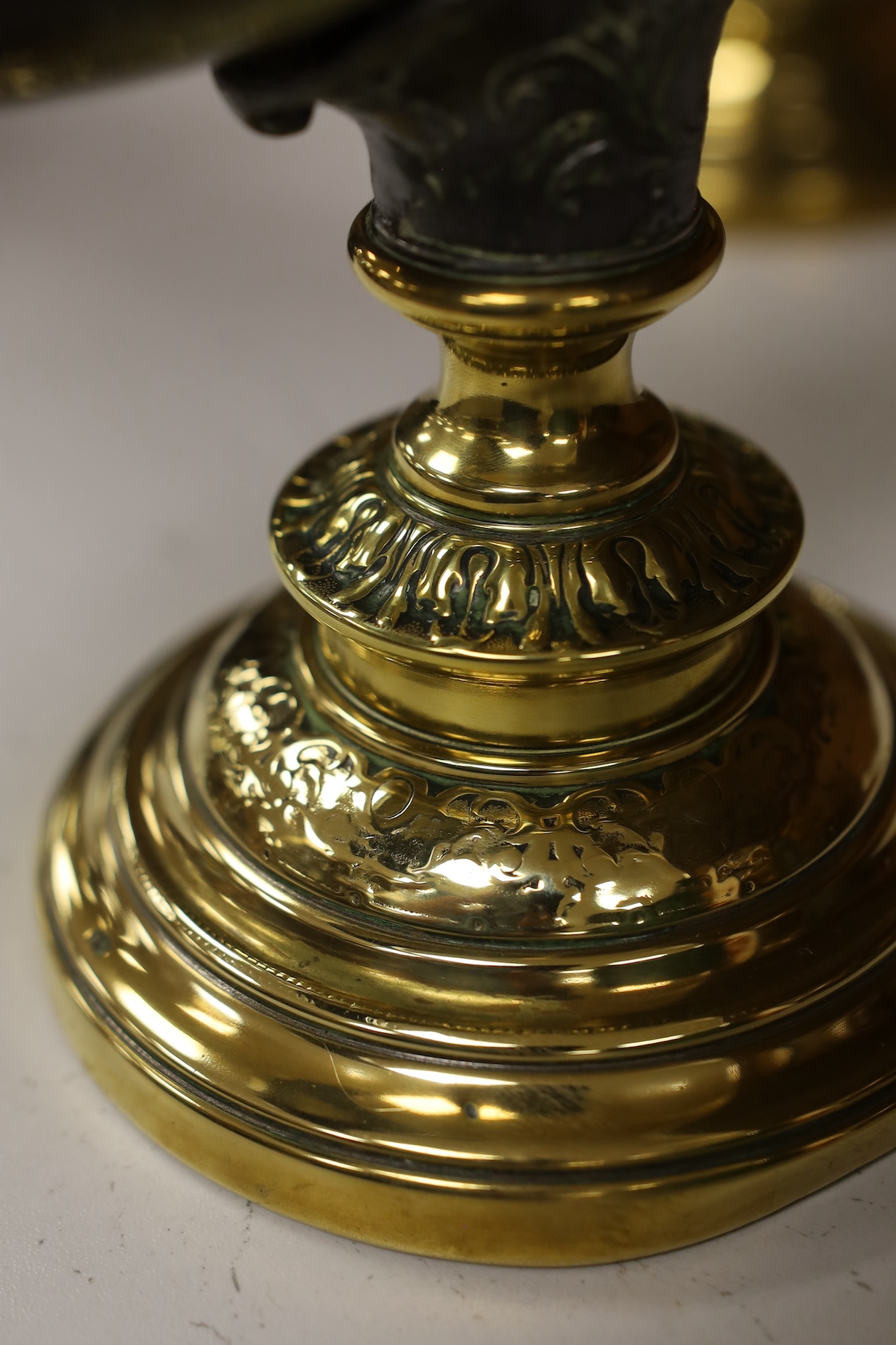 A pair of large decorative brass mounted horns, 33cm high. Condition - brass mounts dented and horns scratched in places